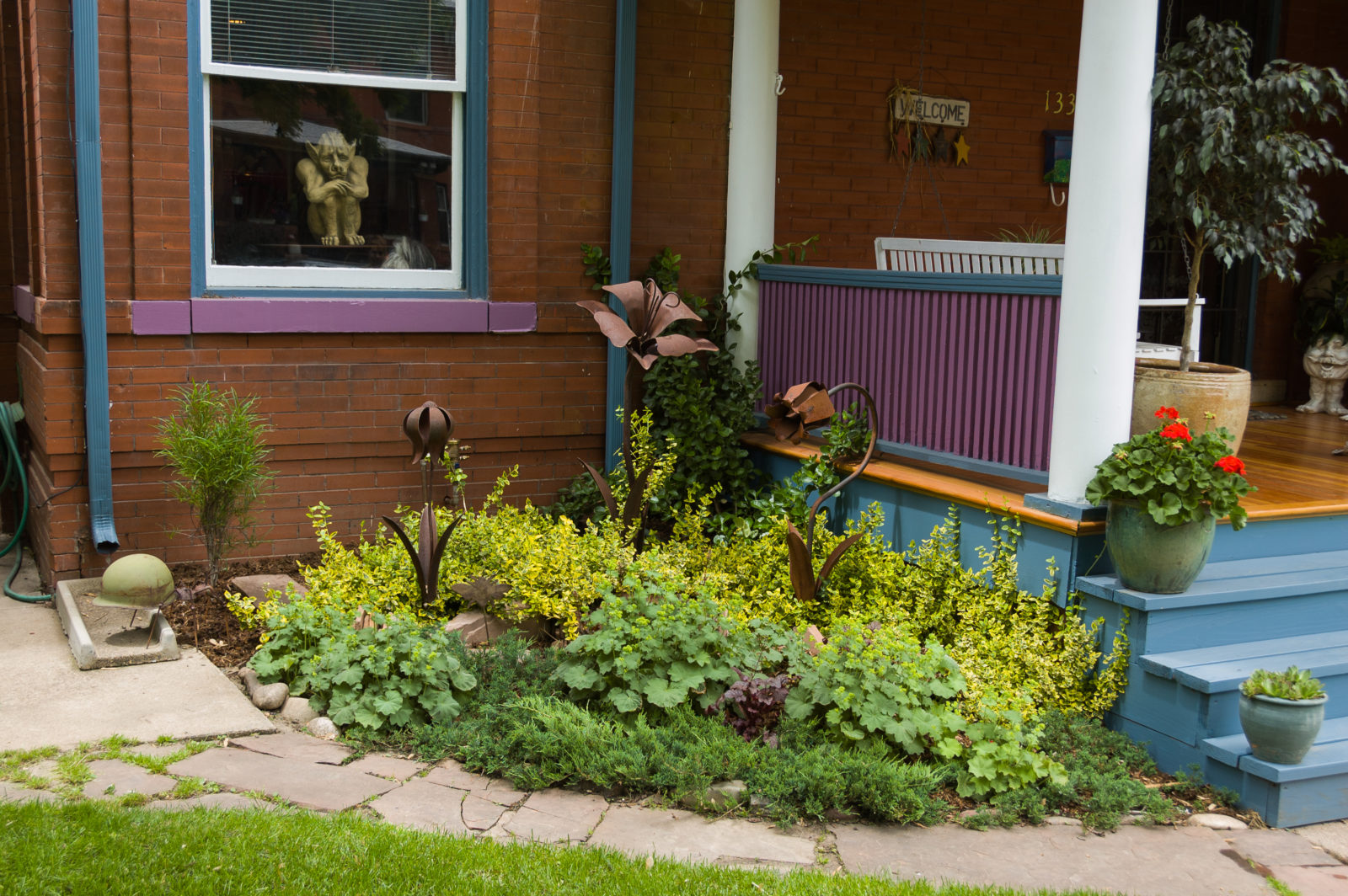 Dan designed a lovely corner garden by the entryway for this client